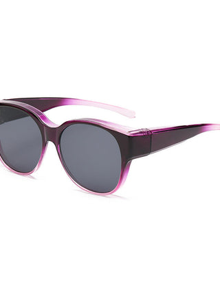 Overzet zonnebril met cat-eye montuur en getinte glazen