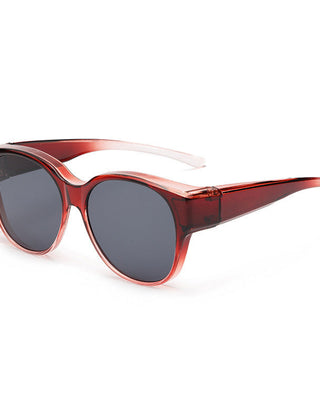 Overzet zonnebril met cat-eye montuur en getinte glazen
