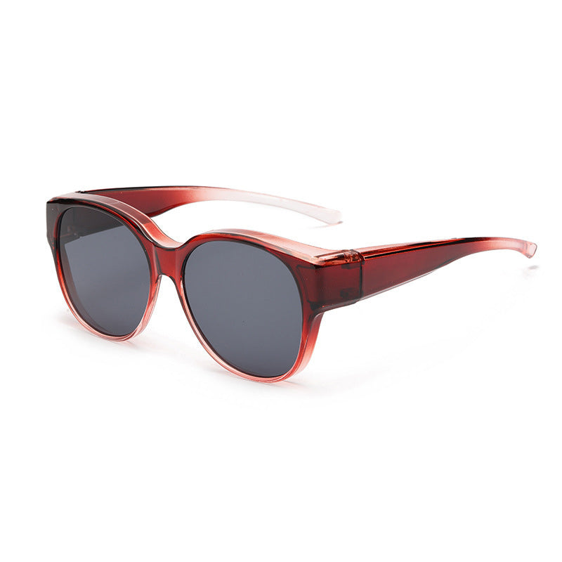 Overzet zonnebril met cat-eye montuur en getinte glazen
