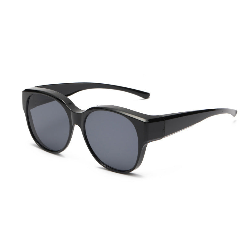 Overzet zonnebril met cat-eye montuur en getinte glazen