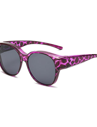 Overzet zonnebril met cat-eye montuur en getinte glazen