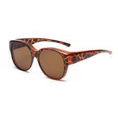 Overzet zonnebril met cat-eye montuur en getinte glazen