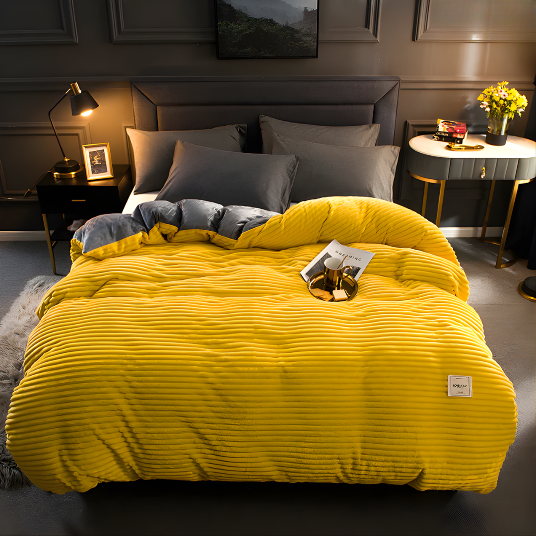 Fleece dekbedset met kussensloop op een opgemaakt bed