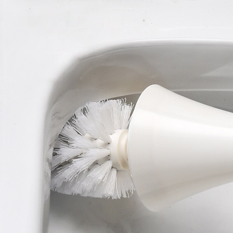 Toiletborstel met goudkleurige houder op ronde voet