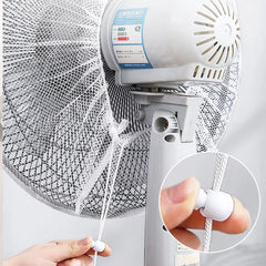 Stofhoes over een staande ventilator