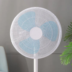 Stofhoes over een staande ventilator