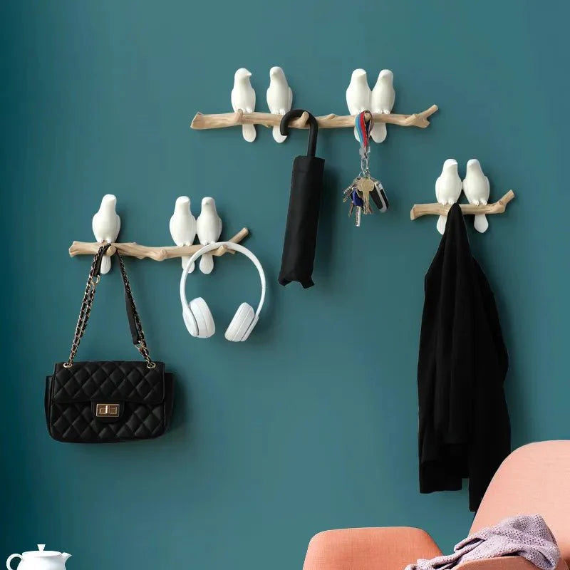 Witte wandkapstok met vogeltjes als haken