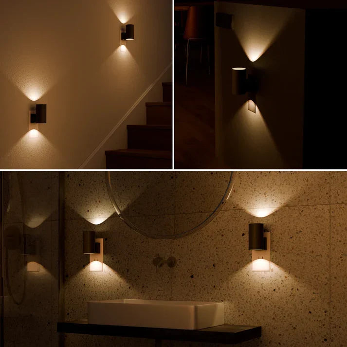 LED-wandlamp in een stopcontact met warm licht
