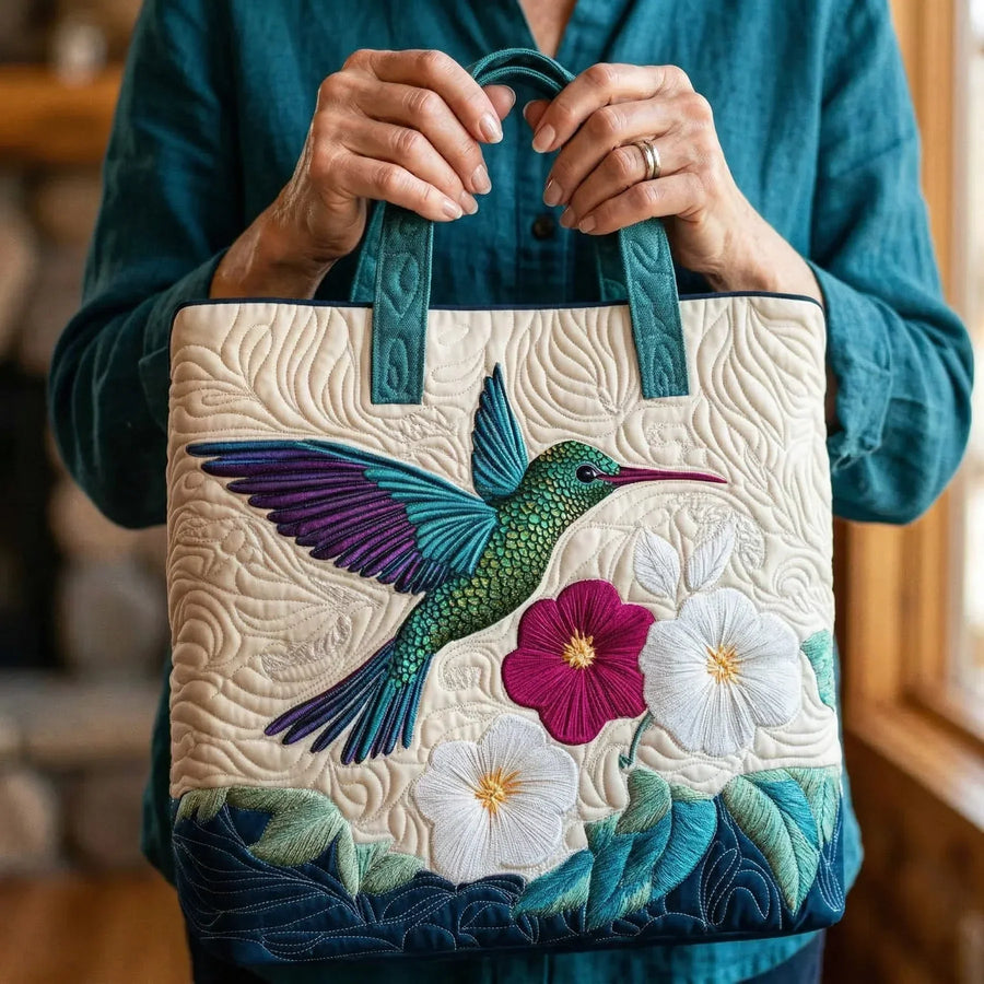Gewatteerde shopper tas met print van een kolibrie en een witte bloem