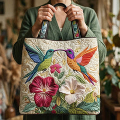 Gewatteerde shopper tas met print van een kolibrie tussen witte bloemen